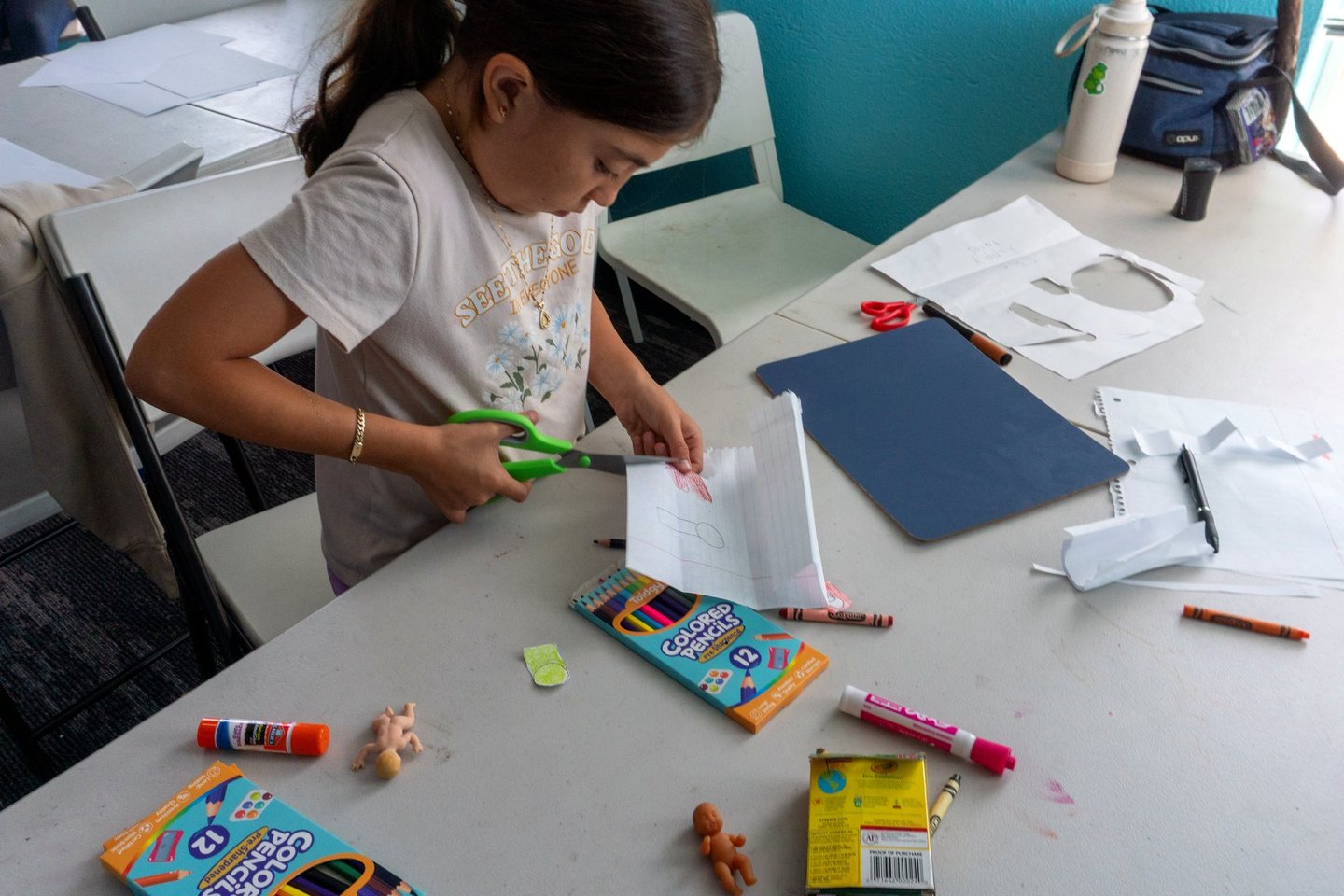 A Hope Horizon student focused on an art project