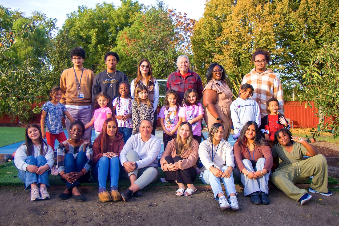 Hope Horizon students, families, and staff gathered together outdoors in East Palo Alto