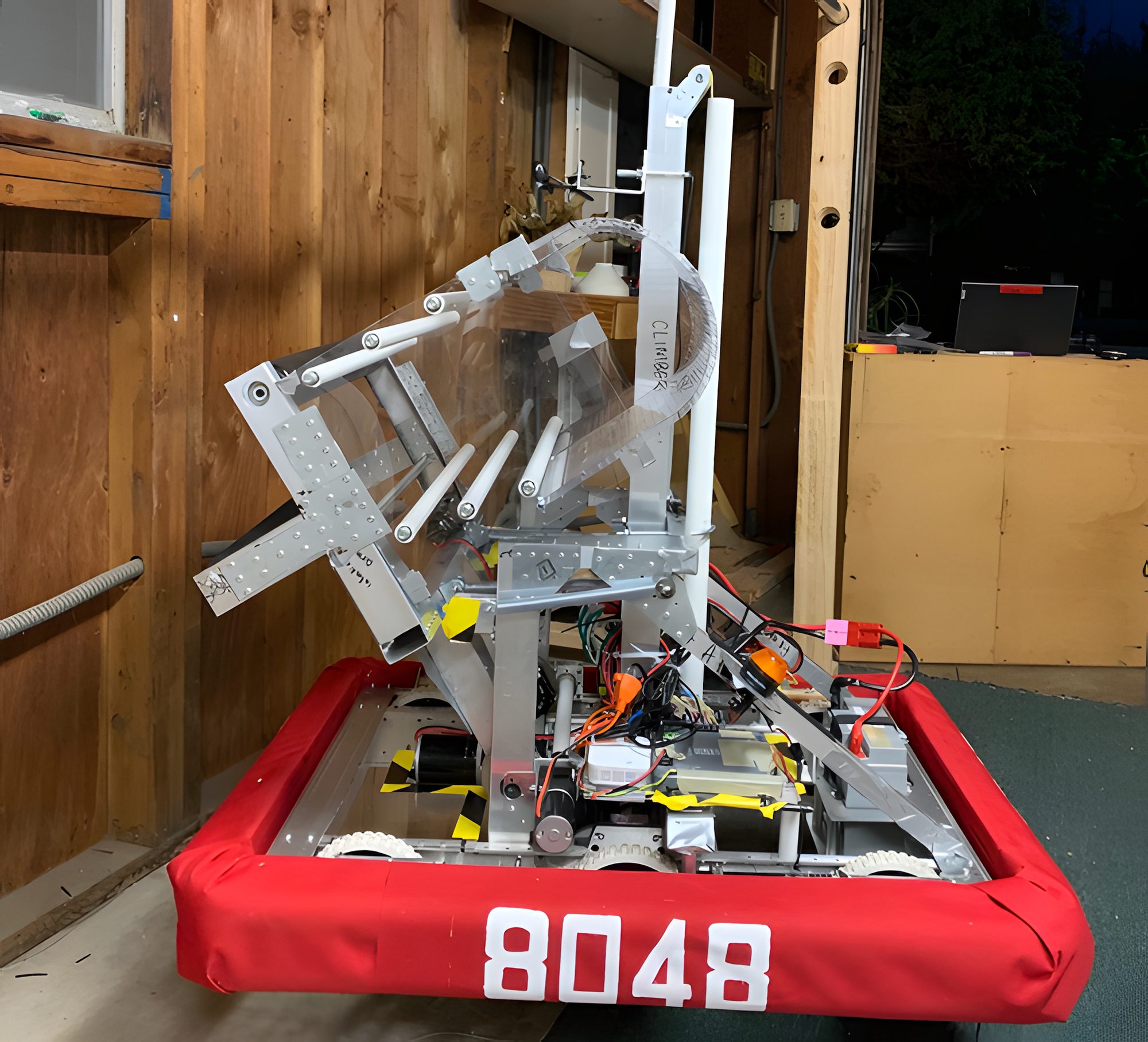 Connie, the 2020 and 2021 robot, with its tall shooter tower and red 8048 bumpers